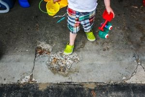 little-boy-wearing-shoes-on-wrong-feet
