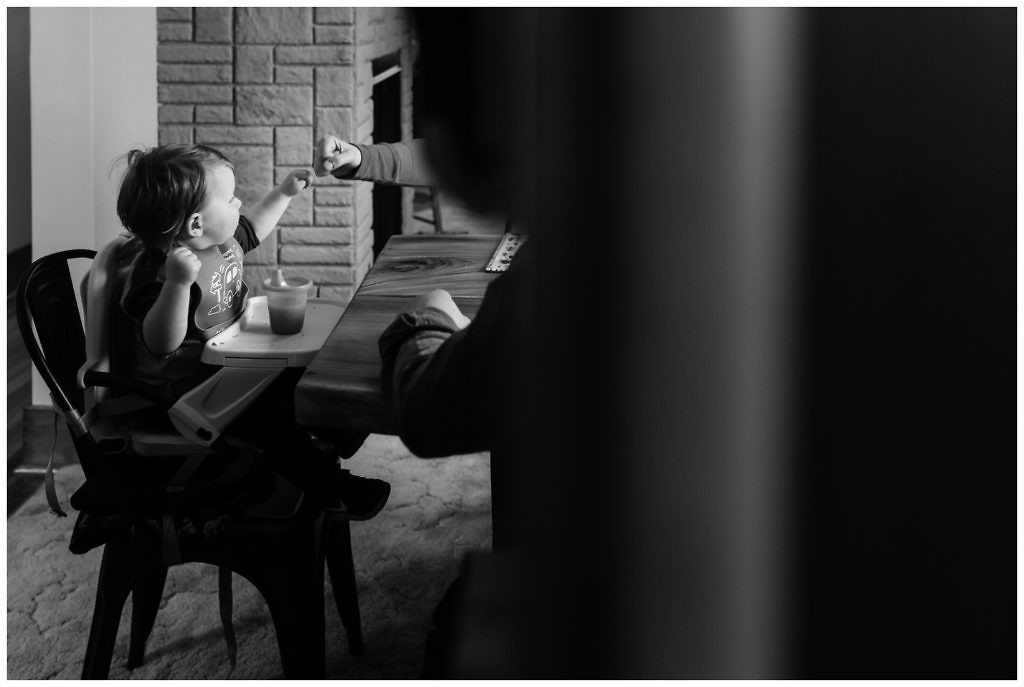little-boy-gives-dad-fist-pump-at-the-breakfast-table-for-eating-all-his-pancakes