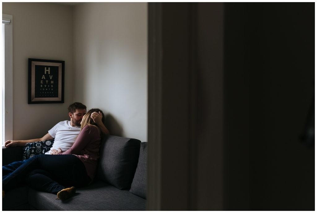 revelstoke-couple-embrases-lovingly-while-relaxing-in-their-new-downtown-home